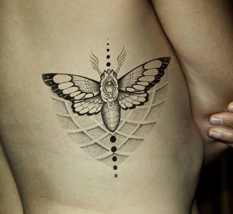 tatuering mal geometriska prickar revben kvinna