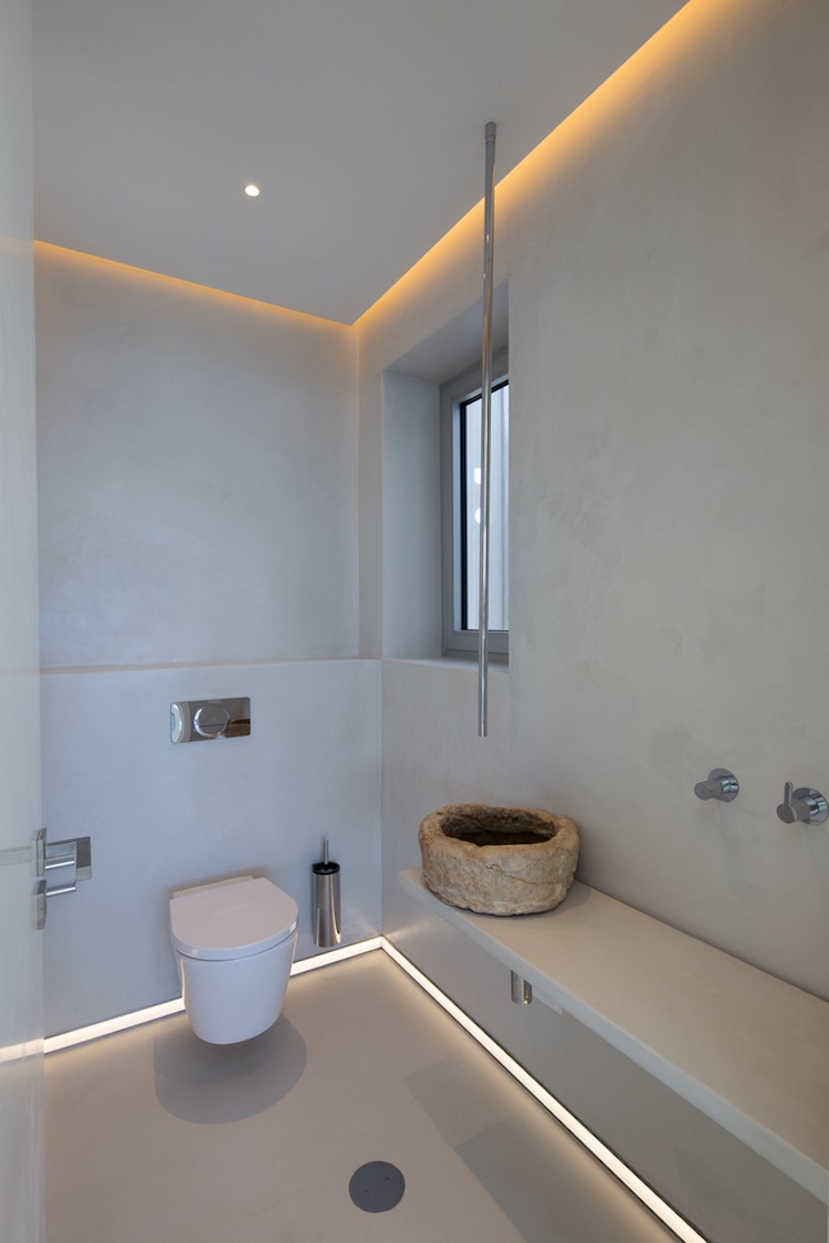 WC vägg design effekt gips natursten tvättställ