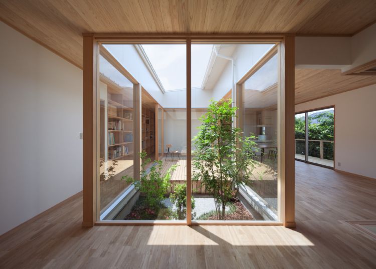 naturlig belysning inredning design fönster glas ljus integrera arbetsplats lägenhet hus bygga vardagsrum trädgård