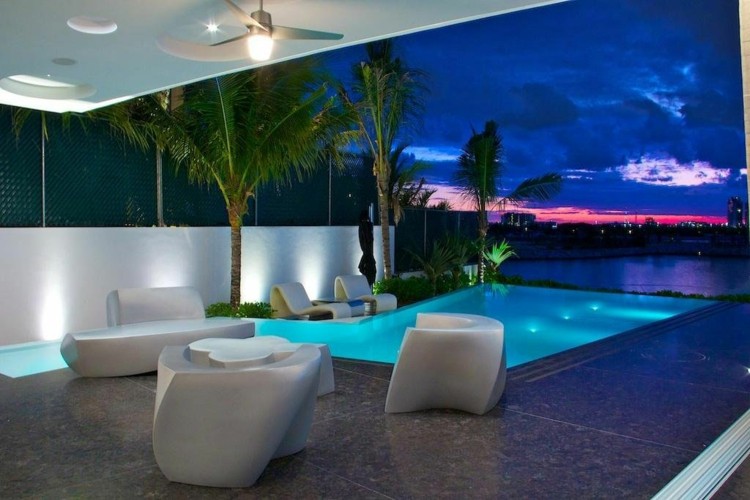 natursten golv-utanför-granit-grå-pool-terrass-modern-lounge-möbler-vit
