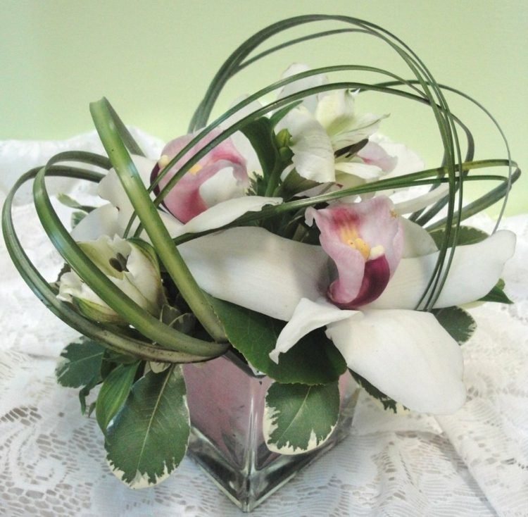 orkidéer dekorationsarrangemang glasblad kombination interiör