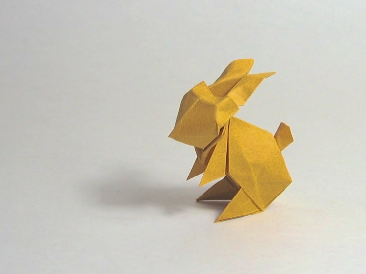 origami kanin sitter svans design idé gul ​​färg