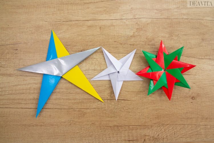 origami -stjärnor barn övar på att göra sig själva