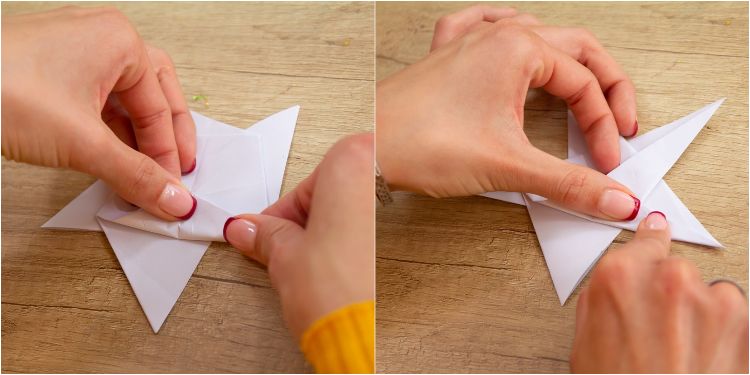 origami stjärnor pyssla julstjärnor själv vitt pappersark vika i fem punkter