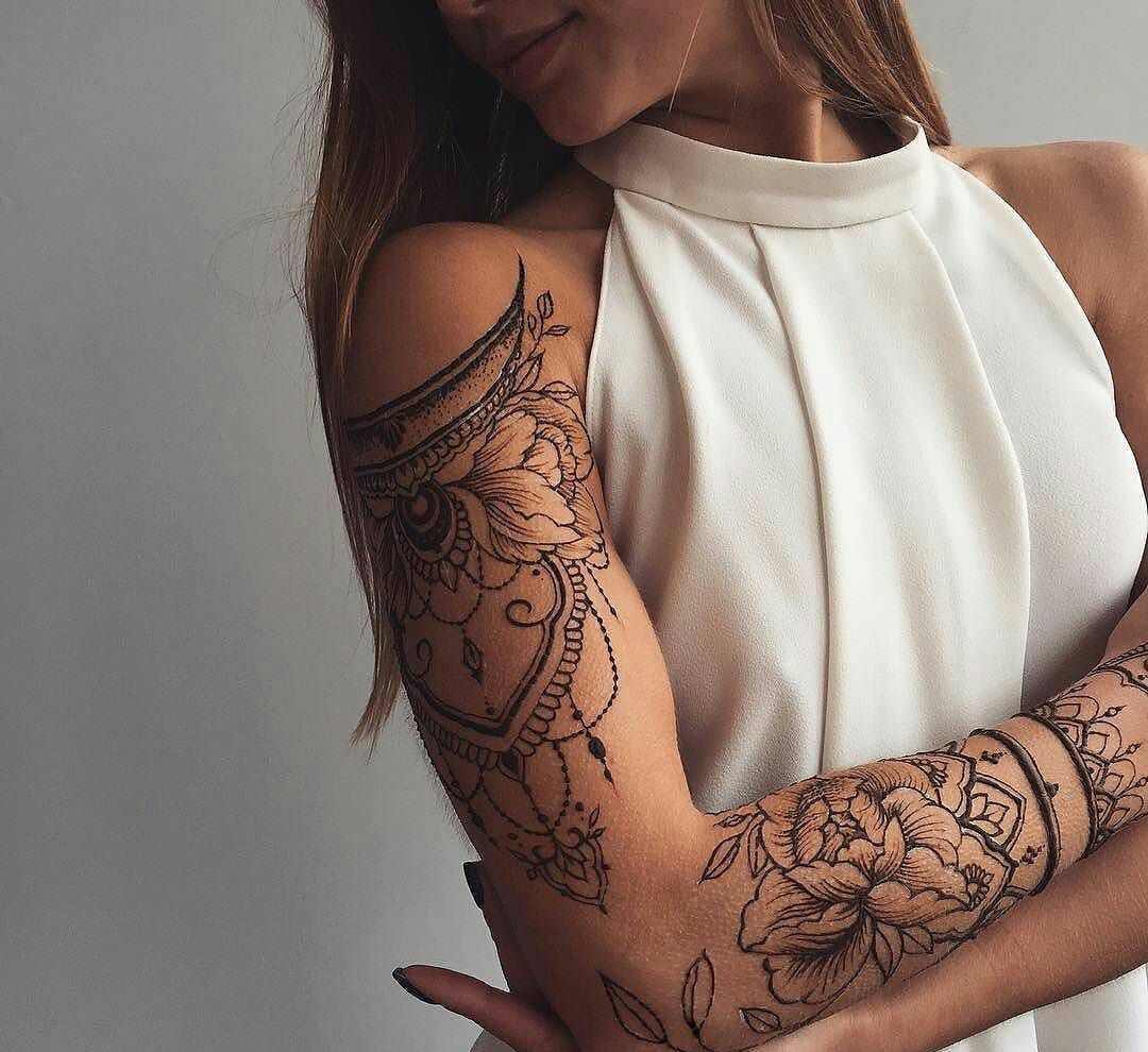 Tatuering design kvinnor arm tatuering smärta mandala motiv mening