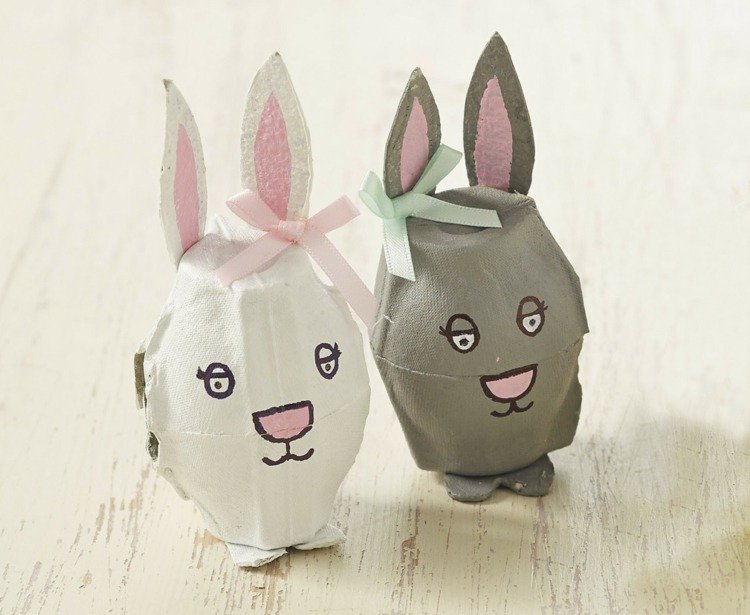 Påskhantverk med äggkartonger stående-kaniner-grå-vita-öron-kartong-ansiktsmålning