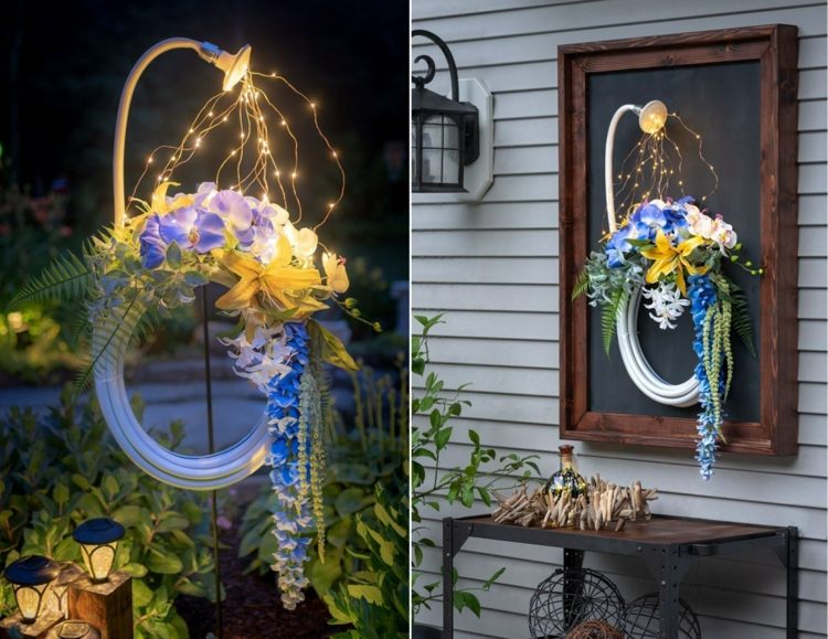 Vacker vårdekoration för trädgården med trädgårdsslang, blommor och LED -lampor