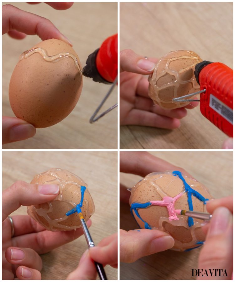 Dekorera ägget med en varm limpistol silikon och måla sedan med akrylfärg