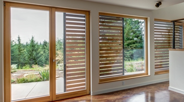 miljövänlig husdesign passiva fönsterluckor sparar energi