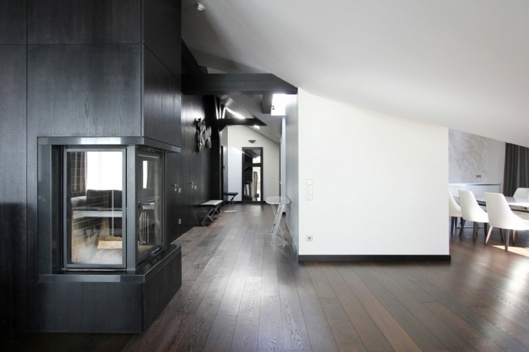 minimalistisk inredningsstil penthouse design öppen spis mörkt trä