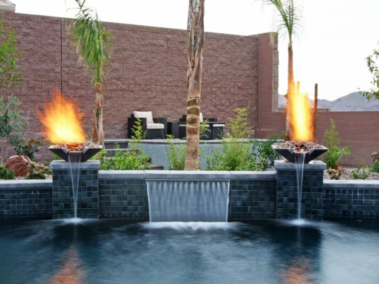 Pool-trädgård-hög-sten-vägg-vattenfall-brazier-palmer