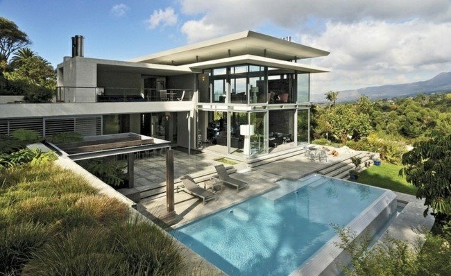 Pool betong infinity pool hus skog