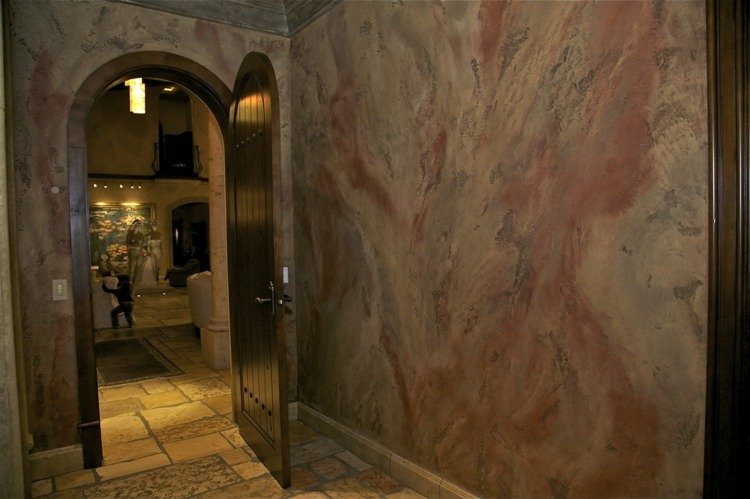 gipsväggar venetiansk marmorimitation av röda stenplattor