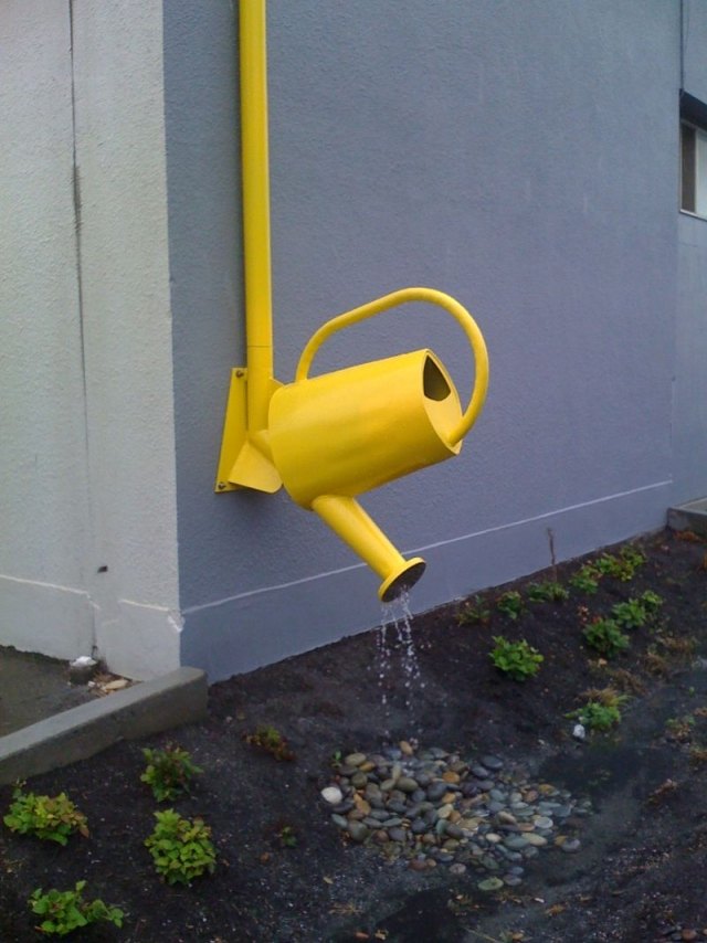 kreativa idéer-bevattningssystem-vattenkanna användning av regnvatten
