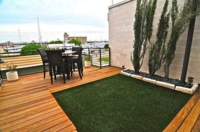 Konstgjord gräsbetongvägg trägolv möbler design
