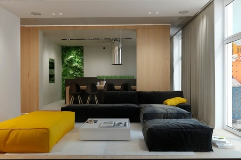 inredning-idéer-grå-färgade-accenter-vardagsrum-soffa-svart-moduler-gul