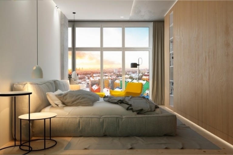inredning-idéer-grå-gul-sovrum-stoppad säng-väggbeklädnad-trä