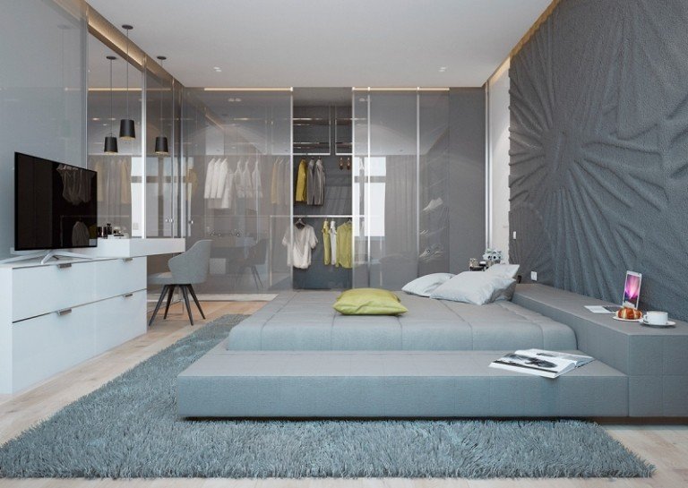 Inredningsidéer -grå-struktur-vägg-sovrum-stoppad säng-tv-konsolmatta