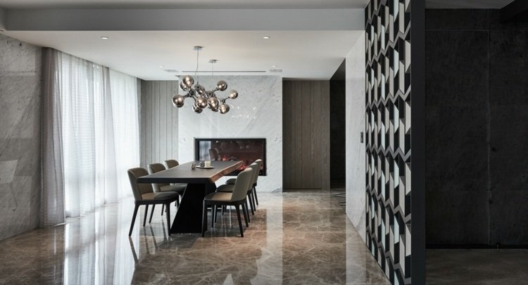 designer rumdelare massivt trä marmorgolv vardagsrum spis minimalistisk inredning
