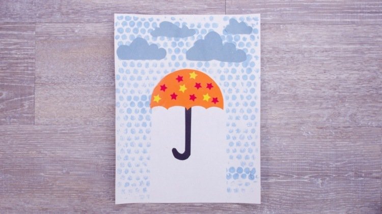 Gör ett paraply och skapa en bild med regndroppar av bubbelplast