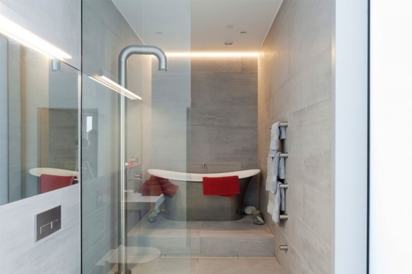 badrum badkar exponerad betong