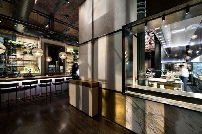 öppet kök restaurang design stål betong trä bar