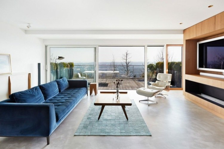 retro möblerad sittgrupp-mörkblå-soffa-matta-lounge-fåtölj