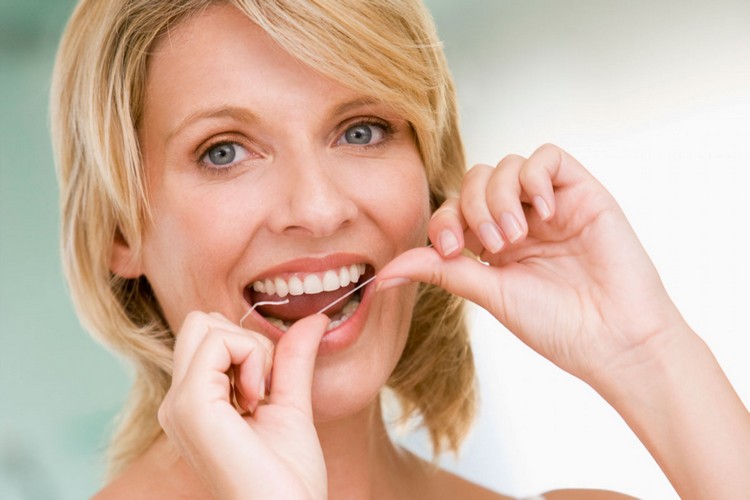 Borsta tänderna ordentligt - använd tandtråd