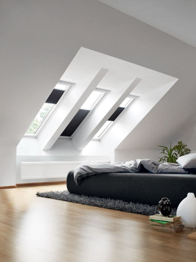 Rullgardiner för takfönster-sovrum-modern-säng-mörkgrå-laminatgolv-flexibel