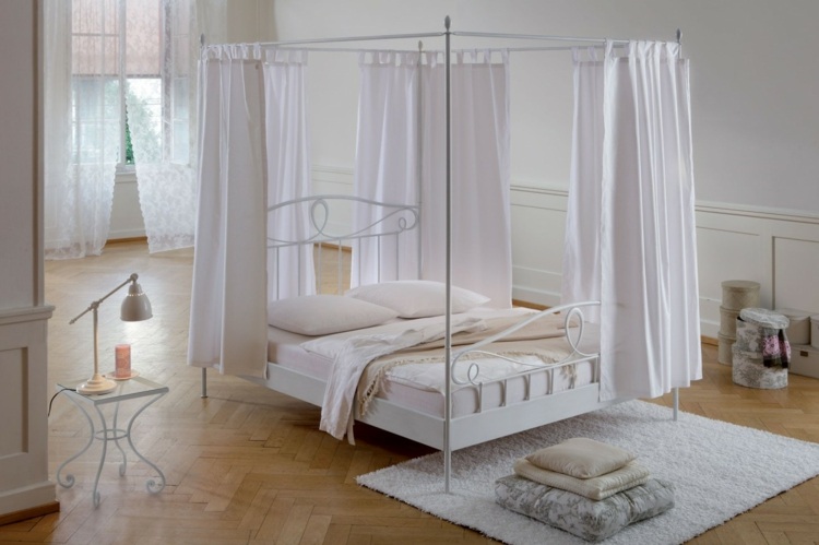 romantisk sovrum himmelsäng idé vit möbler inredning matta