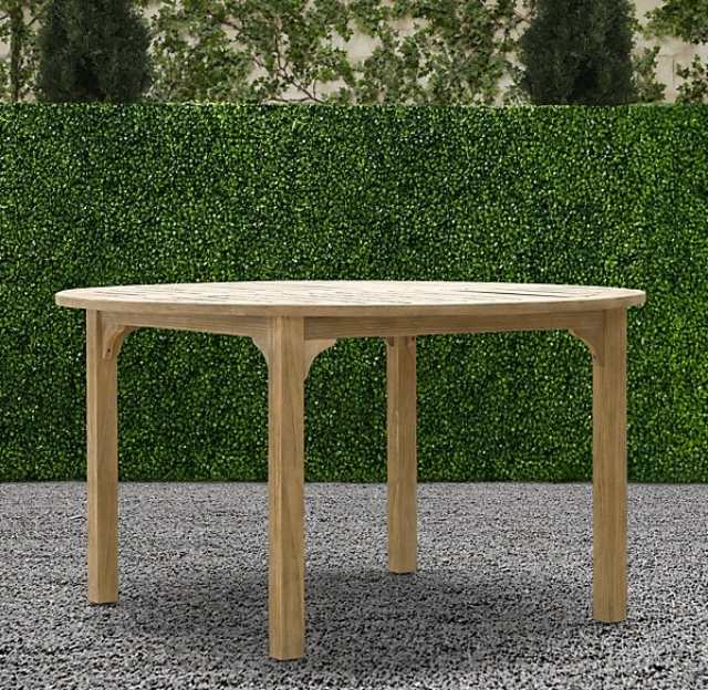 Runt trädgårdsbord tillverkat av trägrävande möbeldesign-klassiker