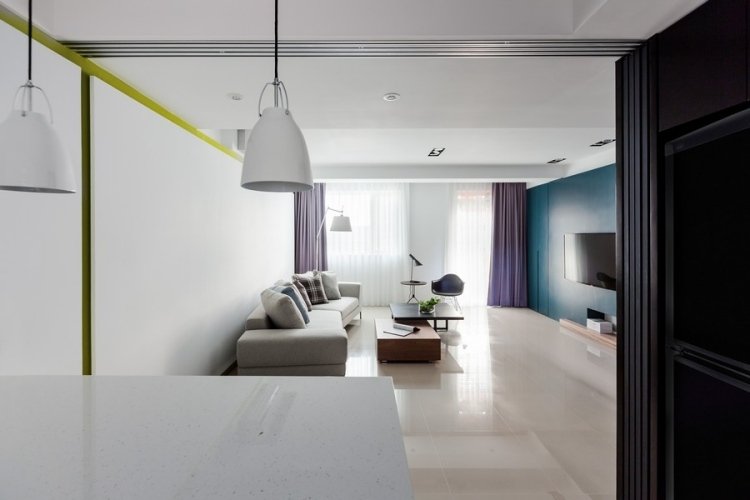 Skjutdörr-kök-vardagsrum-modern-vit-soffa-grå-minimalistisk-enkel