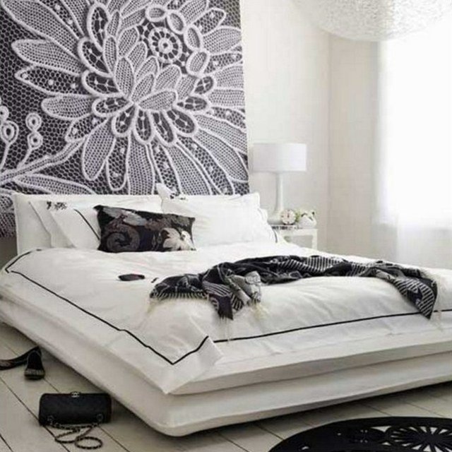 modern sänggavel svart vit spetsig blomma