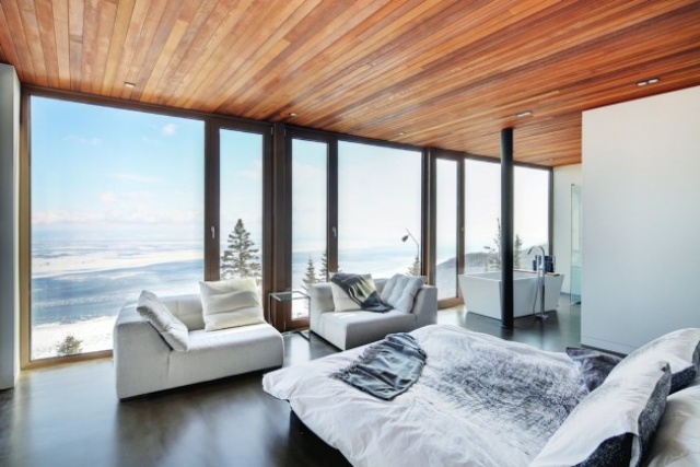 modernt sovrum trä tak design infälld panoramafönster