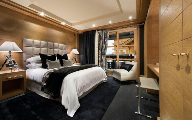 lyxigt sovrum trä väggbeklädnad svart queen size -säng