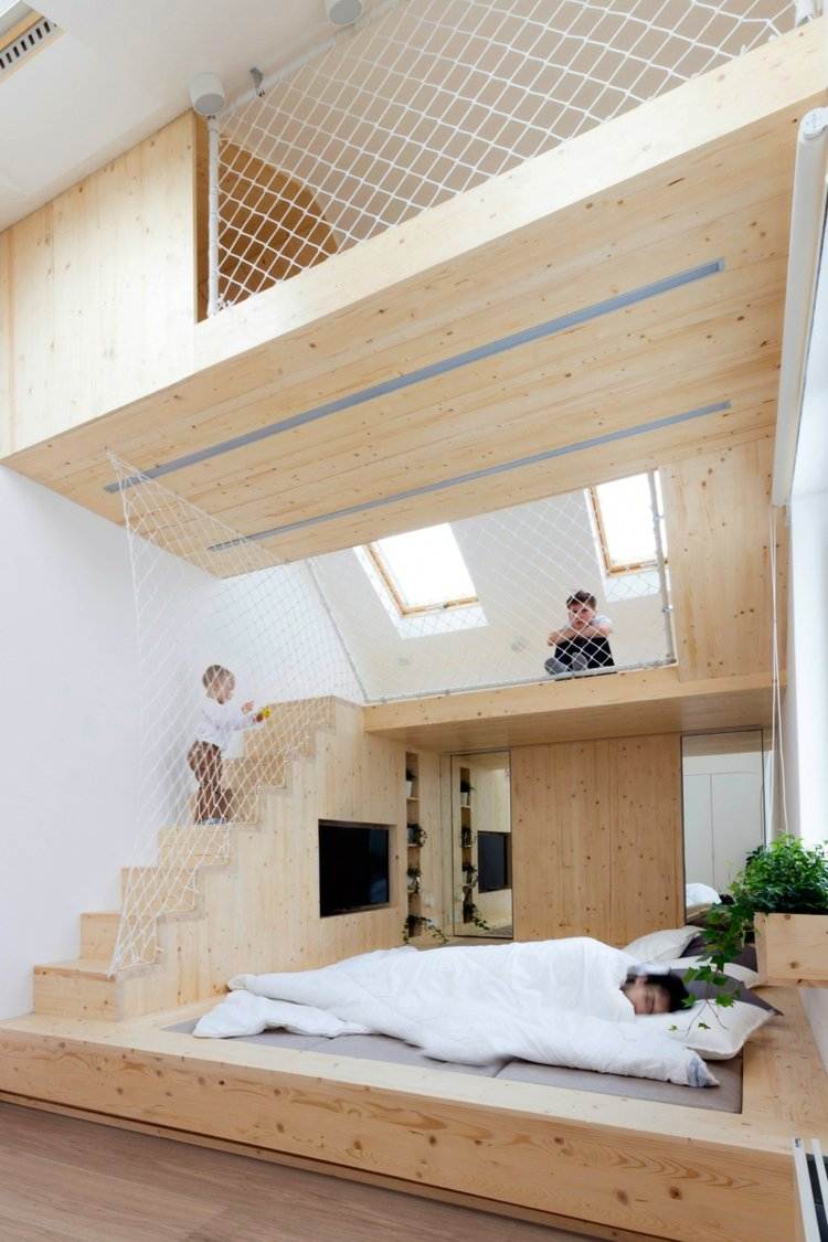 sovrum med lekplats sovplats-piedestal-säng-rum design
