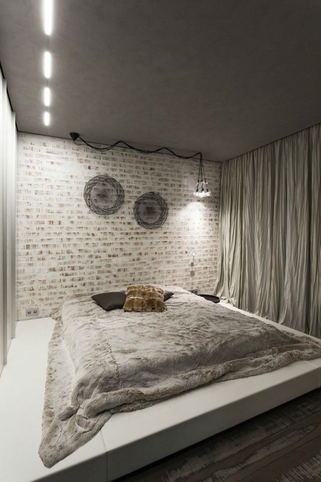 sovrum-modern-design-grå-tak-vit-putsad tegelvägg-