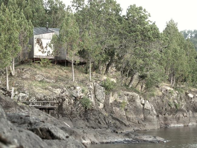 rock shore designer träbastu med sjöutsikt