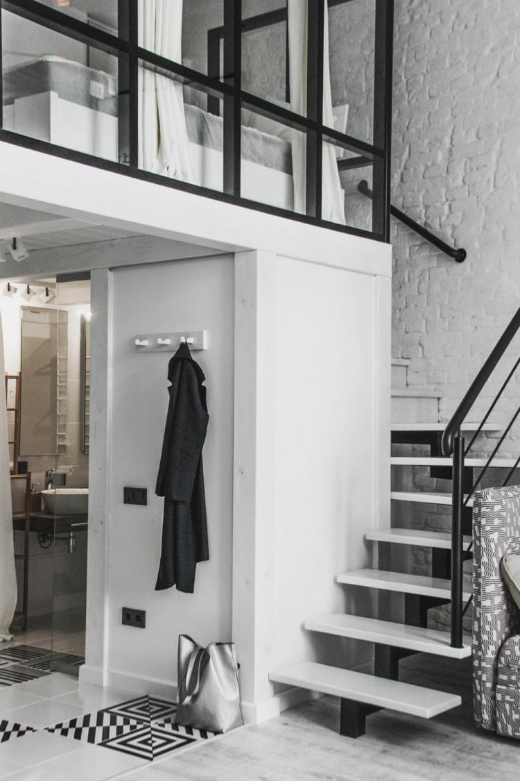 svartvitt inredning omshumelda ukraina lviv loft lägenhet badrum öppet vardagsrum elegant färgkontrast