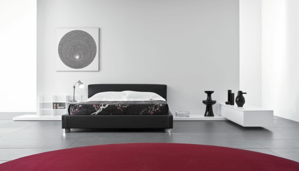 minimalistiskt sovrum i svart och vitt