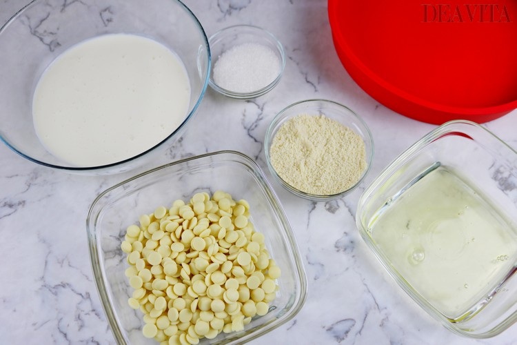 Ingredienser och produkter för påsktårta med vit chokladgrädde mandelmjöl och äggvita
