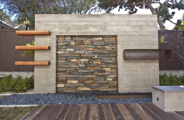 Trädgårdsvägg natursten trä betong stensten väg minimalistisk arkitektur