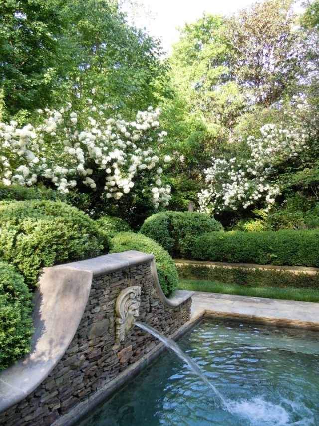 Vattenträdgård Simdamm Bygg en trädgårdsdamm med en fontän