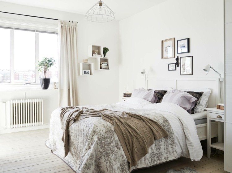 scandinavian living bedroom grå överkast vita parkettbilder