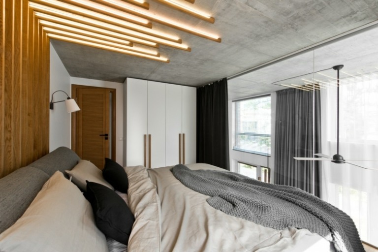 Skandinavisk stil i grå säng betongtak glasvägg