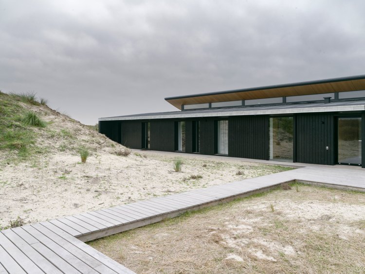 Modern villa glidande fasad sand