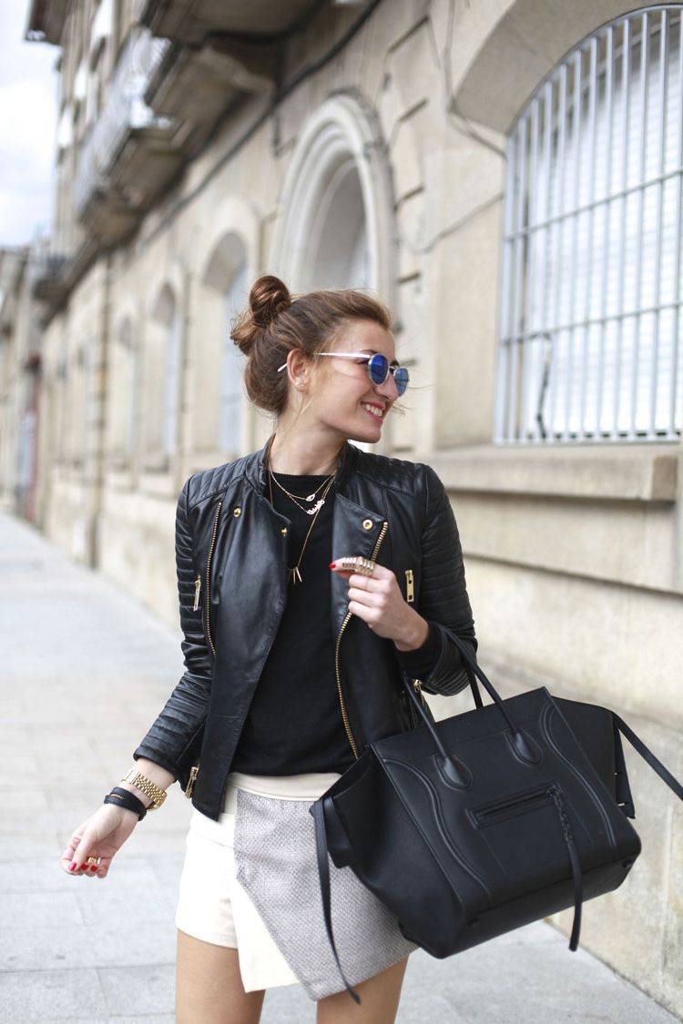 Skort kombinera läderjacka läderväska runda solglasögon nya modetrender kvinnor