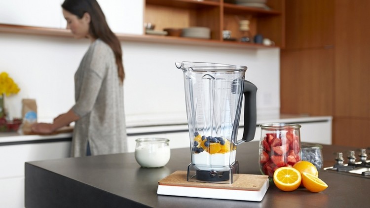 Smarta köksapparater innovation-recept-förslag-bänk-apelsin-kock