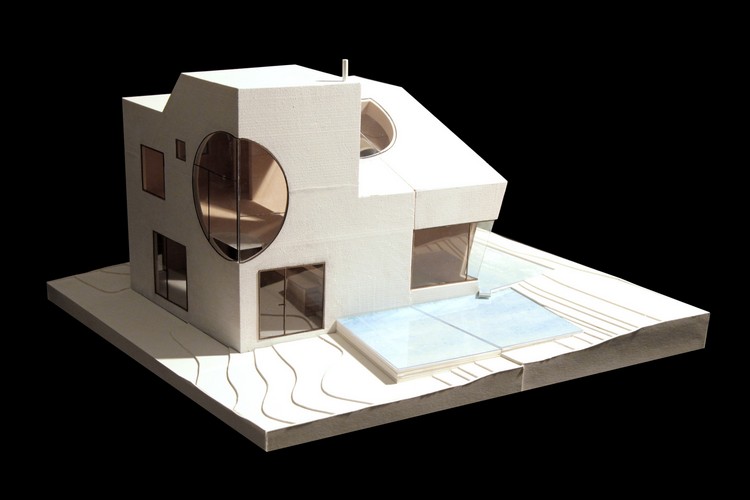 solhus-trä-arkitektur-modell-passiv-hus-hållbart