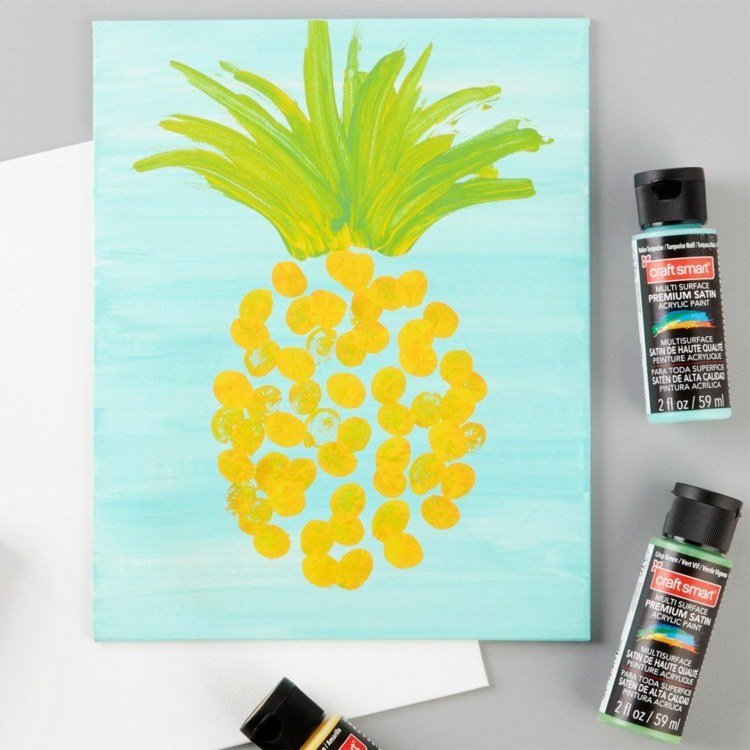 Måla bilder på duk med fingeravtryck - gul ananas med blå bakgrund